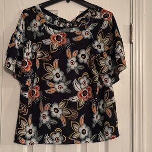LOFT navy floral short sleeve blouse with ruffle sleeve and tie back; size small